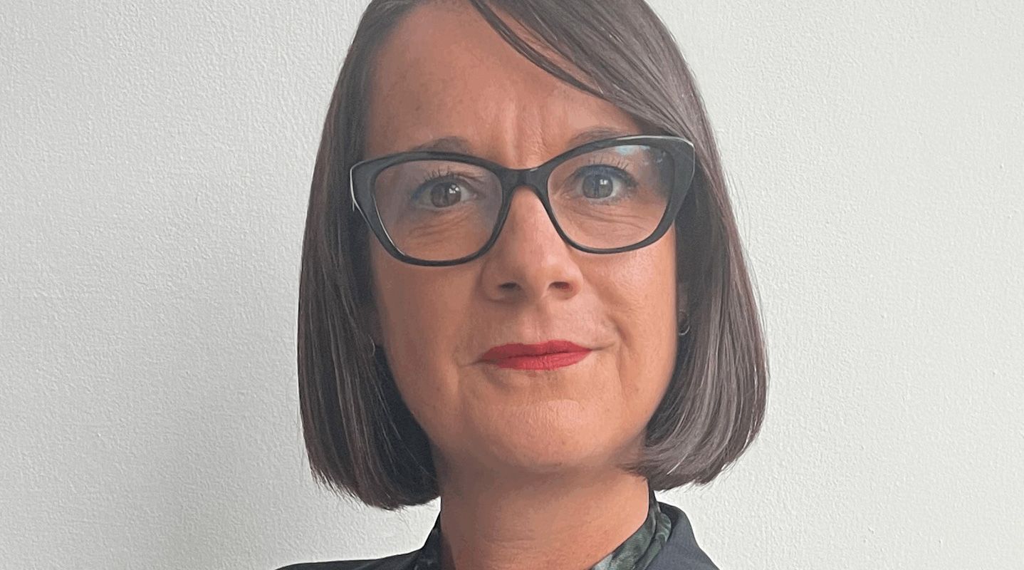 Lady with glasses smiling