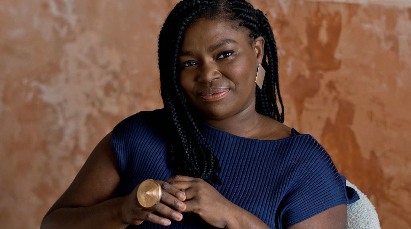 Lady sitting and smiling