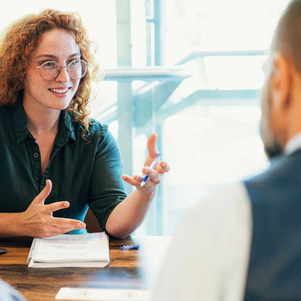 Women accross a desk