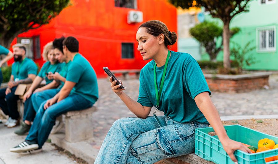 Girl on phone with hand on box