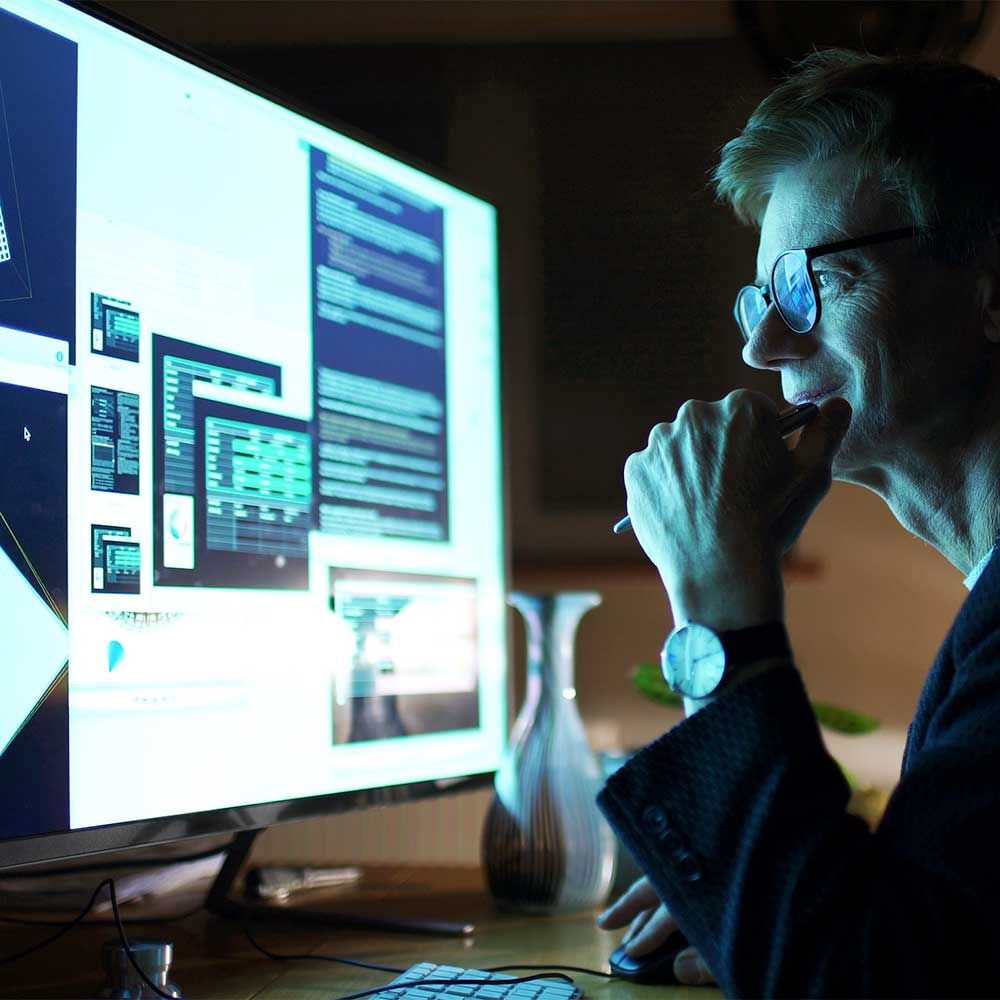 Man looking at complex data