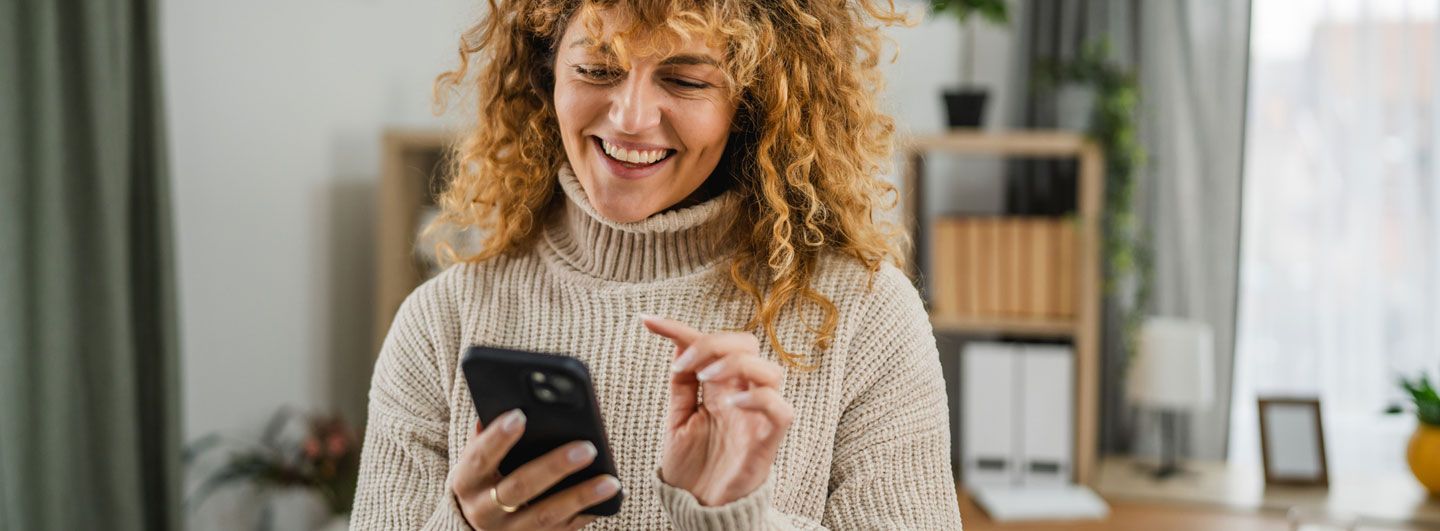 Women smiling on mobile