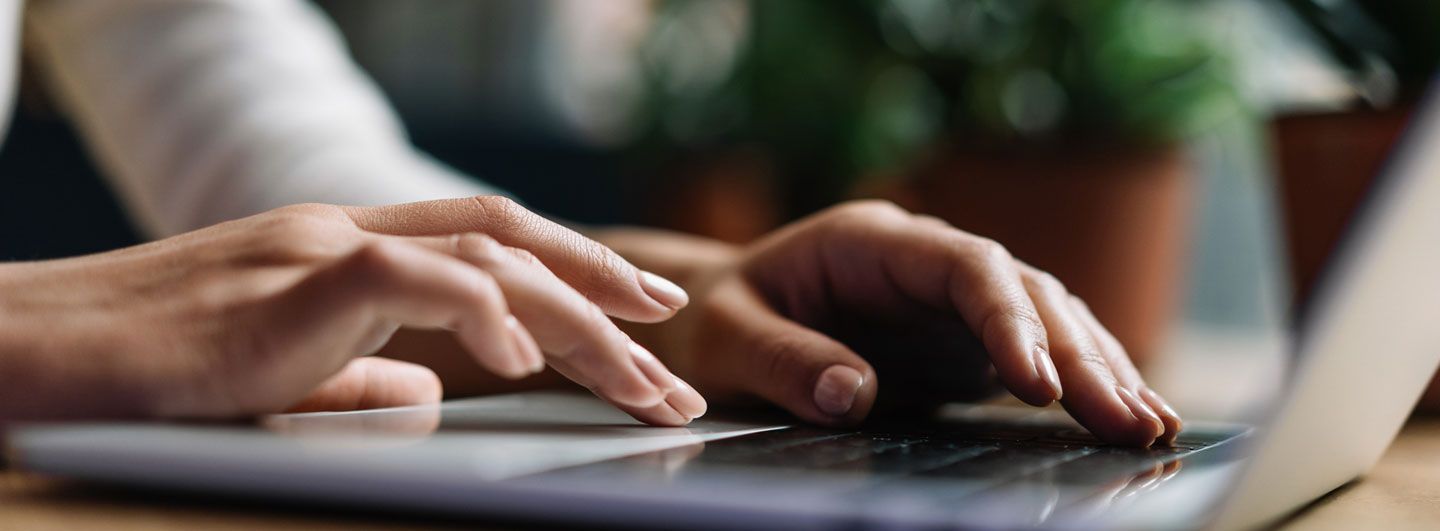 Hands at a keyboard
