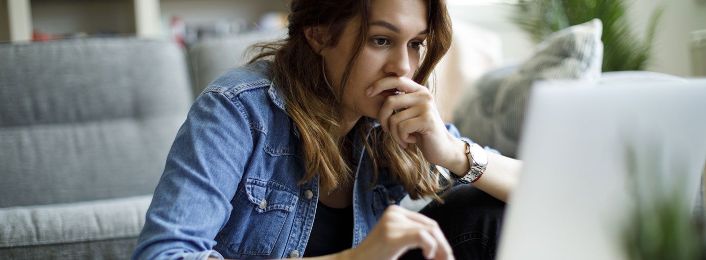 Women looking converned at computer