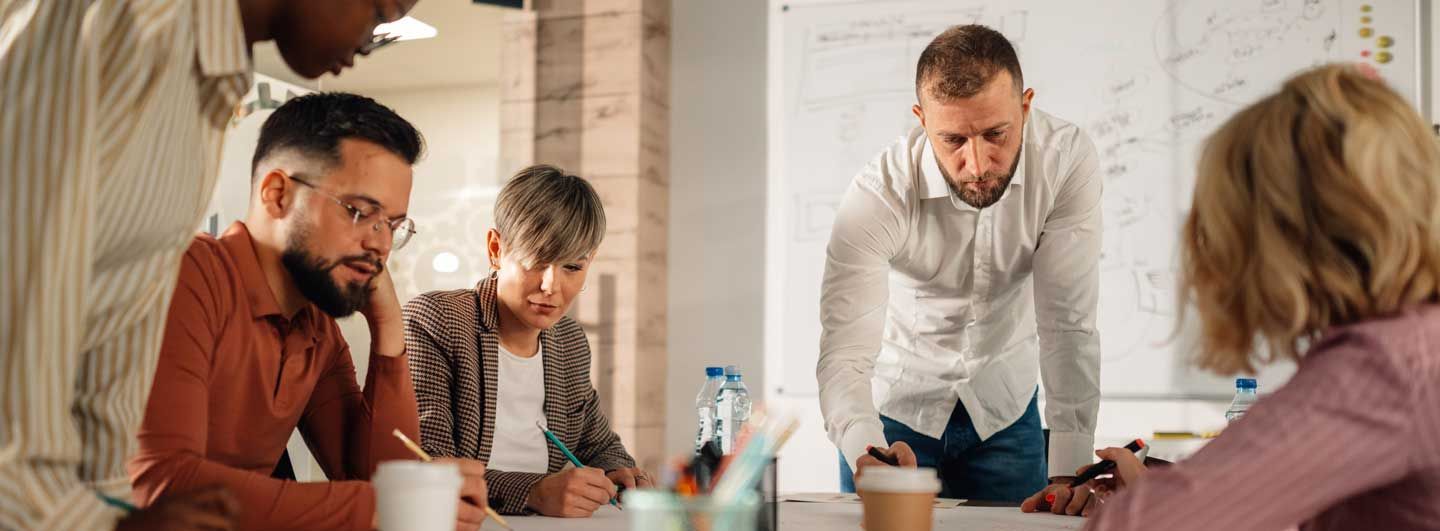 People round an office table