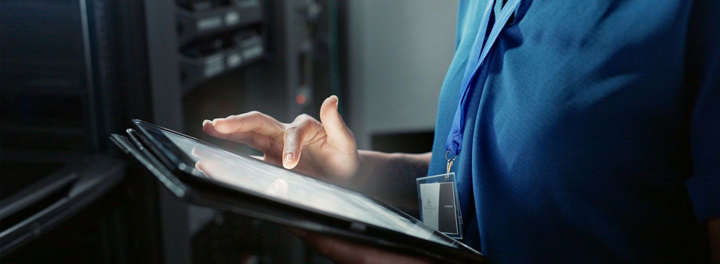 Woman touching tablet screen