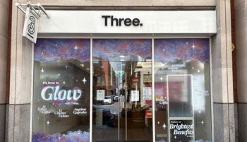 Glow in the shop window of a three store