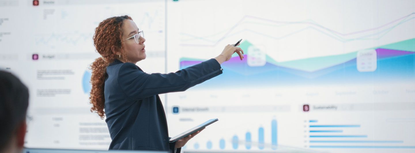 Women pointing to data