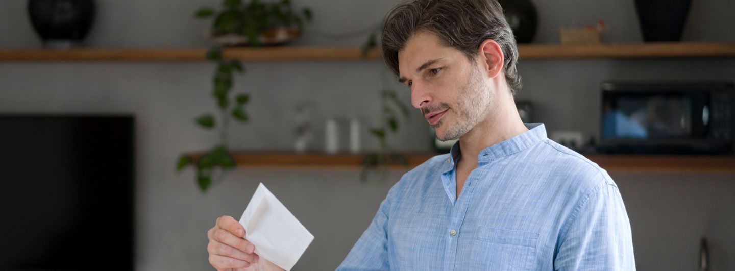 Man recieving letter